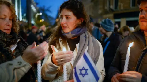 Getty Images A candle-lit vigil was held by the Glasgow Jewish community on Wednesday evening