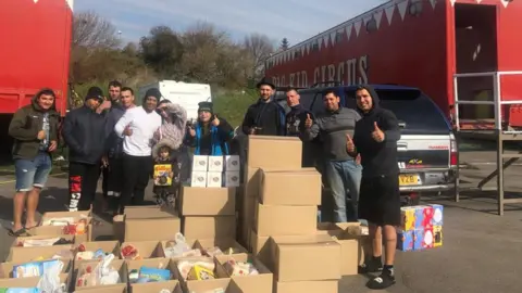 Circus group delivering food