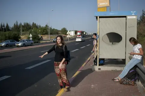 Geraldine Hope Ghelli A hitchhiker in the West Bank