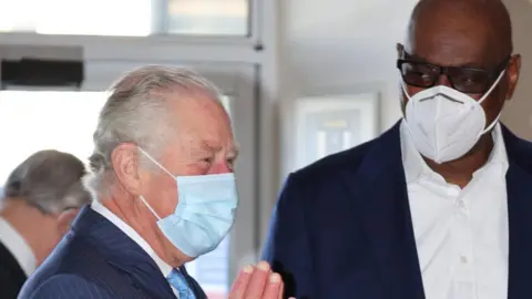 Ian Vogler/Daily Mirror/PA Media The Prince of Wales with Pastor Agu Irukwu (right) during a visit to an NHS vaccine pop-up clinic at Jesus House church, London, where he has been told about work to combat vaccine hesitancy and support for the community during the coronavirus pandemic.