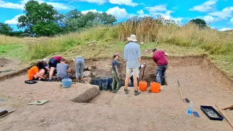 Soulton Hall The team digging into a trench