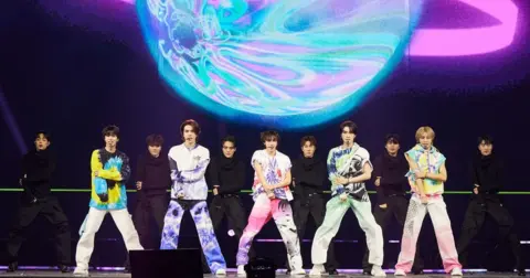 SM WayV doing a dance routine on stage