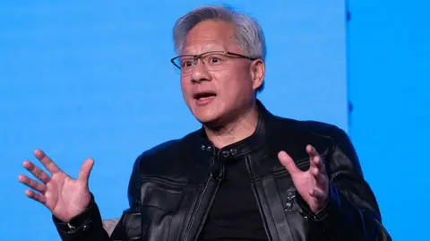 Jensen Huang, CEO of Nvidia, speaks at a panel discussion at London Tech Week on 9 June, 2025 in London. 