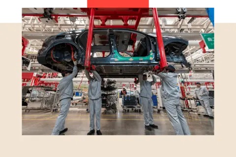 Getty Images Employees assemble new energy vehicles at a factory in China