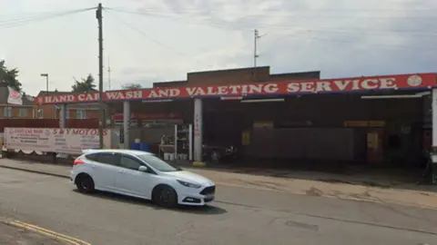 Google Hand car wash and valeting service at a former petrol station in Earl Shilton, Leicestershire