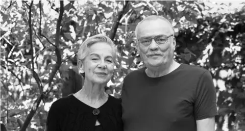 Günter and Christine Starke A black and white image of Christine and Günter Starke. She is waring a black top buttoned at the neck, he is wearing glasses and a dark tee-shirt