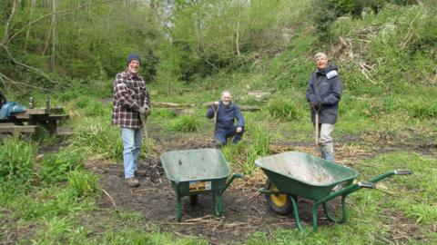 Volunteers starting work on Frome Banks