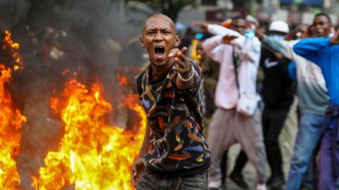 Protesters take part in a demonstration against a controversial tax bill in the central business district in Nairobi, Kenya, 20 June 2024.