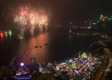 EPA Fireworks light up Victoria Harbour to celebrate the arrival of the new year 2018 in Hong Kong, China, 01 January 2018.