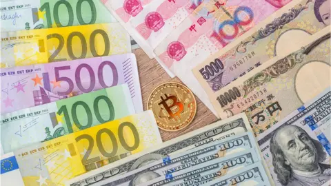 Getty Images Chinese Yuan and Bitcoin