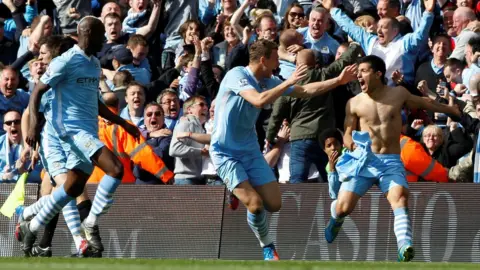 Reuters Sergio Aguero and teammates celebrate his goal against QPR