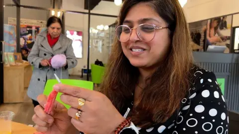 A woman knitting