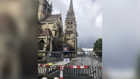 Road closed as Cambridge Catholic church stonework potentially