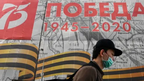 AFP Big banners went up weeks ahead of the victory parade in Moscow