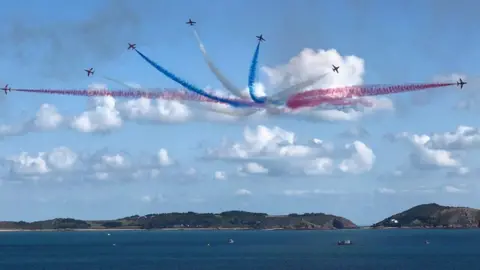 Guernsey Air Display Red Arrows with Herm in the background