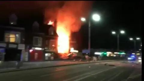 BBC Mobile phone footage of the blast aftermath