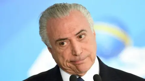 AFP Brazilian President Michel Temer at the Planalto Palace in Brasilia, on June 26, 2017.
