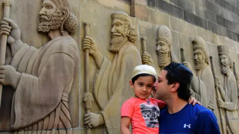 Getty Images Parsi community people celebrating Jamshedi Navroz by visiting the fire temple and offering prayers, at Tardeo