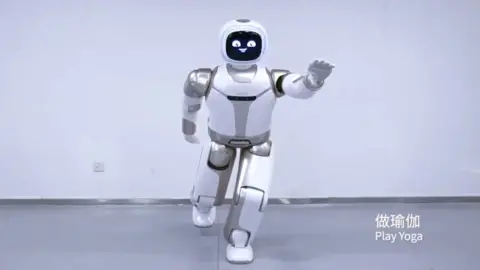 UBTECH The UBTECH Walker robot pulling a yoga pose