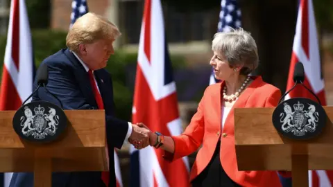 AFP Donald Trump and Theresa May