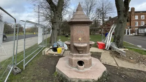Hollie Cole/BBC Hadley Green drinking fountain under construction