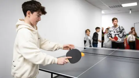 Save the Children / PA Playing table tennis in Warsaw