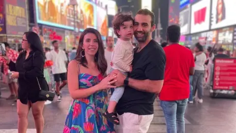 Sammy Nabulsi Wafaa Abuzayda, Yousef Okal and Abood Okal in Times Square