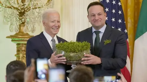 Niall Carson/PA US President Joe Biden accepted a bowl of shamrock from Leo Varadkar on Sunday