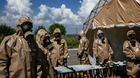 Getty Images Ukrainian Emergency Ministry rescuers attend an exercise in the city of Zaporizhzhia 17 August 2022