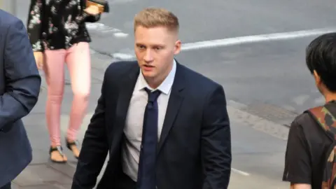 PA Sam Oliver outside court in Sydney