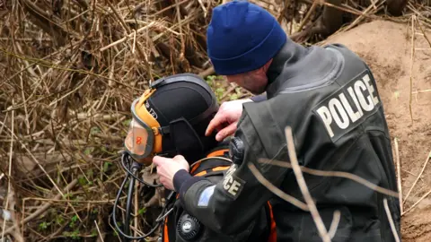 PA Media Police search teams at the River Wyre in St Michael's on Wyre, Lancashire, as they search for missing woman Nicola Bulley, 45, on 7 February 2023