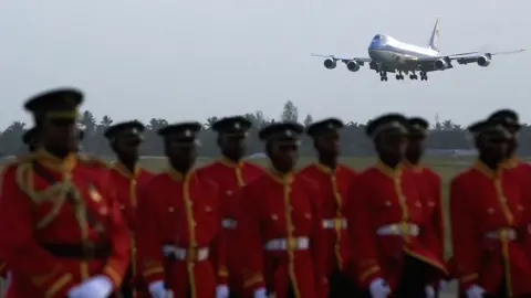 AFP An aeroplane landing at an airport in Dar es Salaam