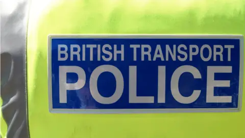 BBC Picture of the back of a British Transport Police officer's jacket
