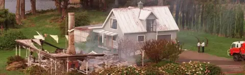 AFP/Getty Images Photo dated 29 April 1996 showing the remains of the guesthouse where Martin Bryant shot his first victims