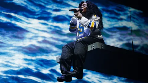 Getty Images SZA performs at the United Center on Feb. 22, 2023, in Chicago
