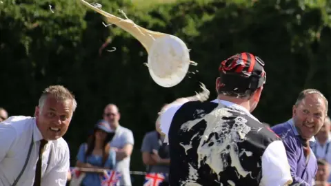 Ian Dawson A custard pie mid throw