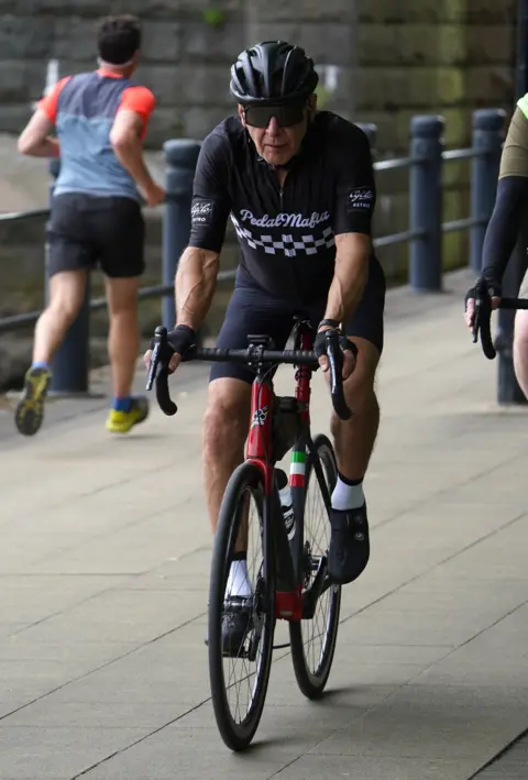 Terry Blackburn Harrison Ford cycling on Newcastle's Quayside