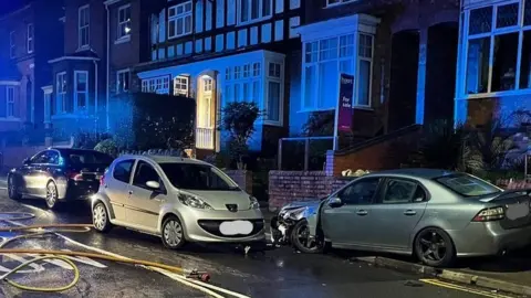 A vehicle crashed in a residential street