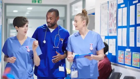 Getty Images Doctors and nurses