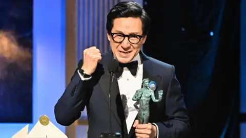 Getty Images Ke Huy Quan accepts the Outstanding Performance by a Male Actor in a Supporting Role award for Everything Everywhere All at Once onstage at the 29th Annual Screen Actors Guild Awards held at the Fairmont Century Plaza on February 26, 2023 in Los Angeles, California