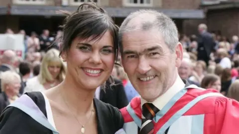 Pacemaker Michael McAreavey with her father, former Tyrone GAA manager Mickey Harte