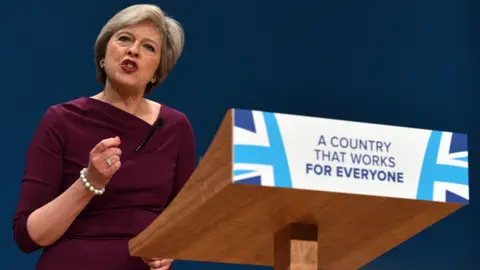 Getty Images Theresa May speaking at the 2016 Conservative Party conference