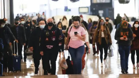 EPA Passengers at San Francisco airport. Photo: 25 November 2020