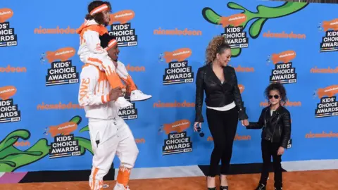 Getty Images Mariah Carey, Nick Cannon, Moroccan Scott and Monroe Cannon