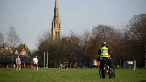 Getty Images Policeman in park