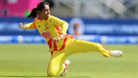 Getty Images Harmanpreet Kaur of Trent Rockets Women fields the ball during The Hundred match between Trent Rockets Women and Northern Superchargers Women at Trent Bridge on 9 August 2023 in Nottingham, England