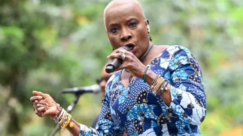 Getty Images Angelique Kidjo performs at Stern Grove in Golden Gate Park on July 16, 2023 in San Francisco, California.