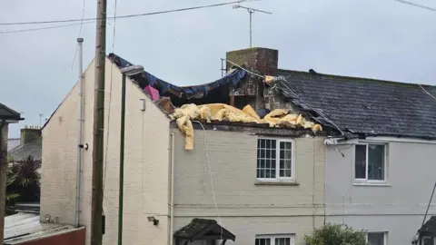 Daniel Ellis House with roof torn off