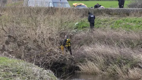 PA Media Police officers search for missing Nicola Bulley in river