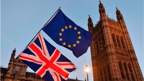 Getty Images UK and EU flags at the Houses of Parliament